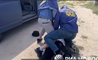 Задержание подозреваемого в подготовке теракта. Скрин видео РИА Новости